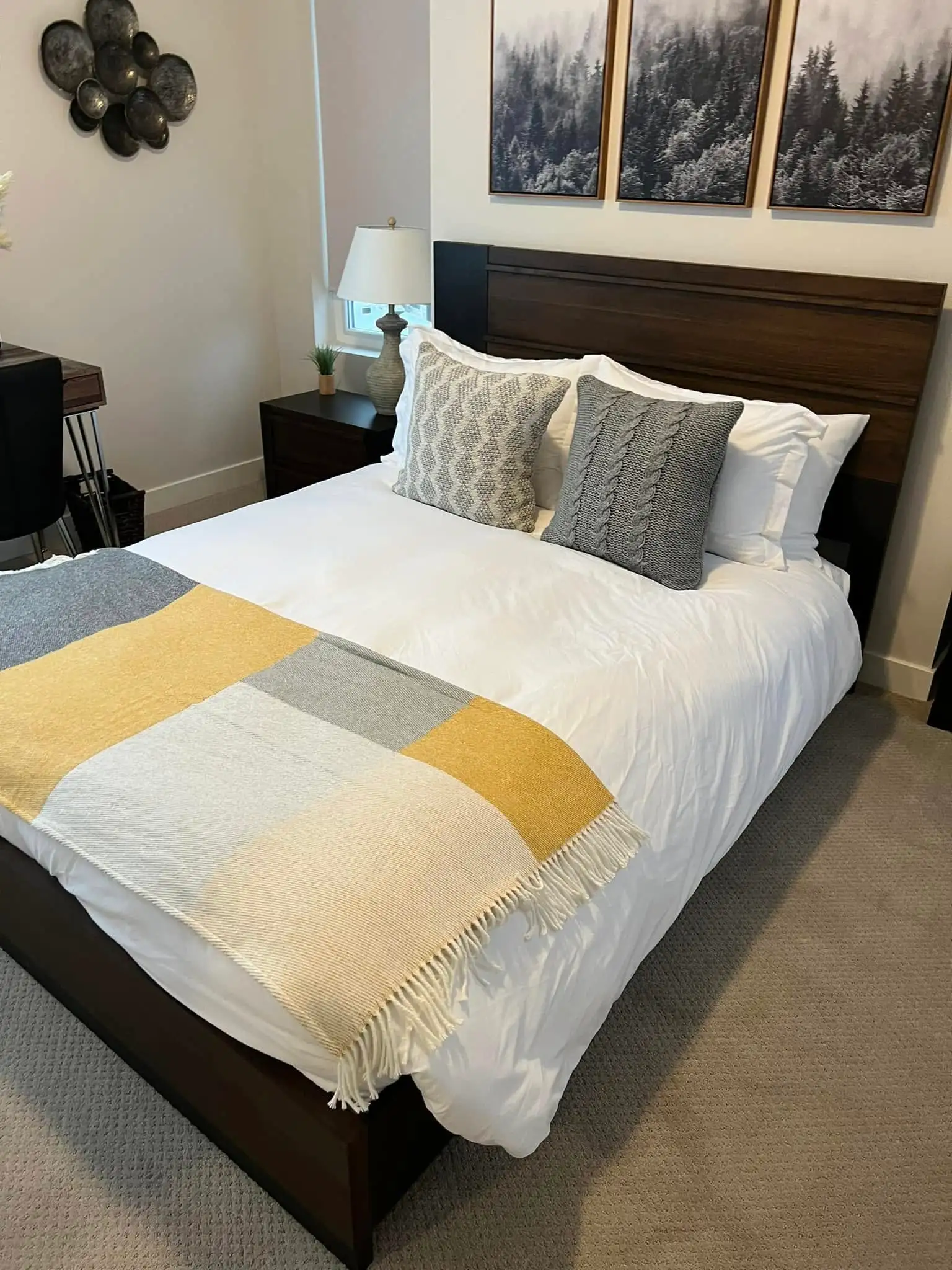 Hotel style staged bedroom after an Airbnb turnover clean in Park City